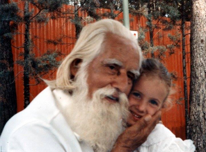 Omraam Mikhael Aivanhov in his garden with a young child. Photo taken in the 70s.