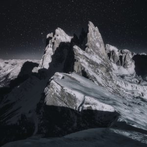 photo of snow capped mountain during evening